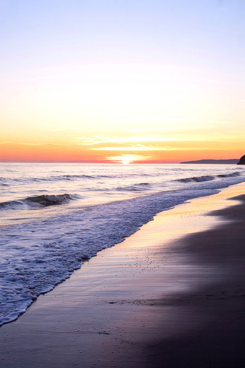 Sunset beach walk date - 25 Valentine's Day Ideas for Newlyweds